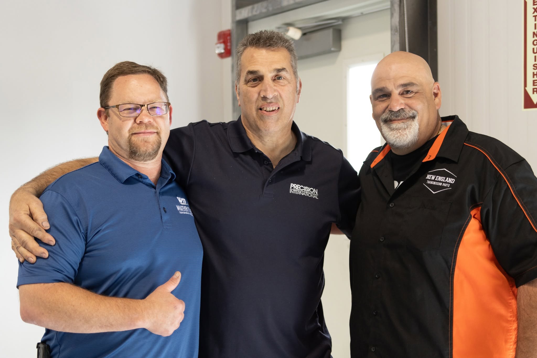 Transmission industry colleagues wearing WIT, Precision International and NETP shirts